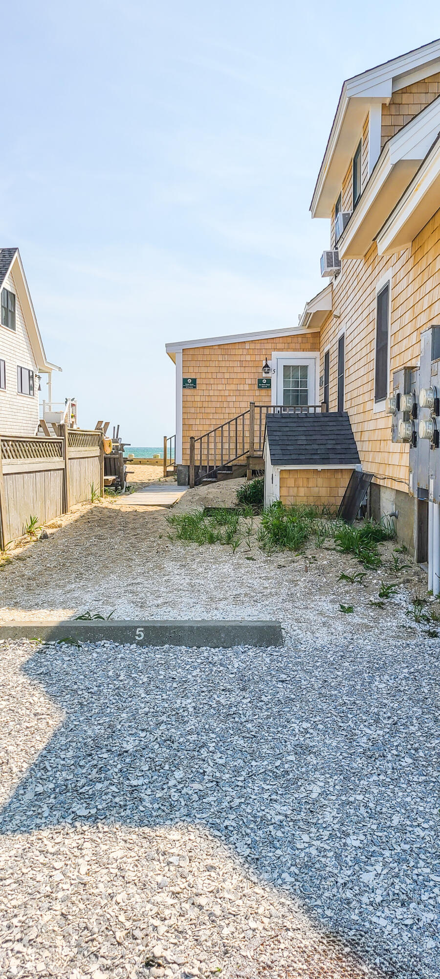 522 Shore Road, Unit 5 Truro, MA 02666 - Photo 25 of 28 a view of a house with a yard