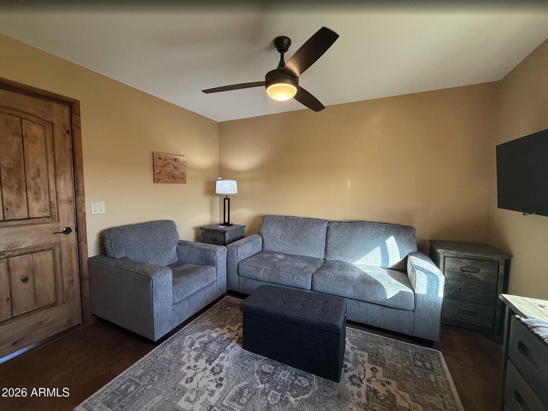 35723 South Amalia Road Eloy, AZ 85131 - Photo 13 of 34 a living room with furniture and a flat screen tv