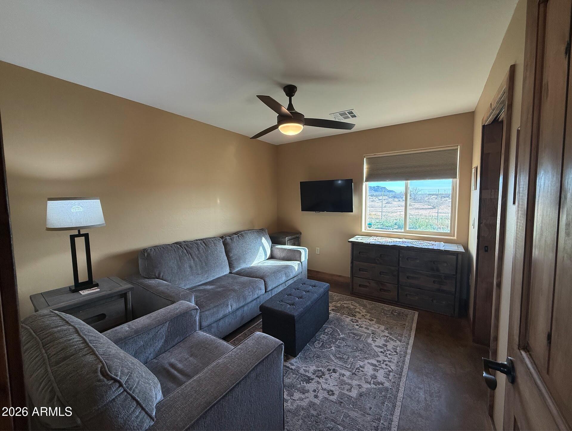 35723 South Amalia Road Eloy, AZ 85131 - Photo 14 of 34 a living room with furniture and a window