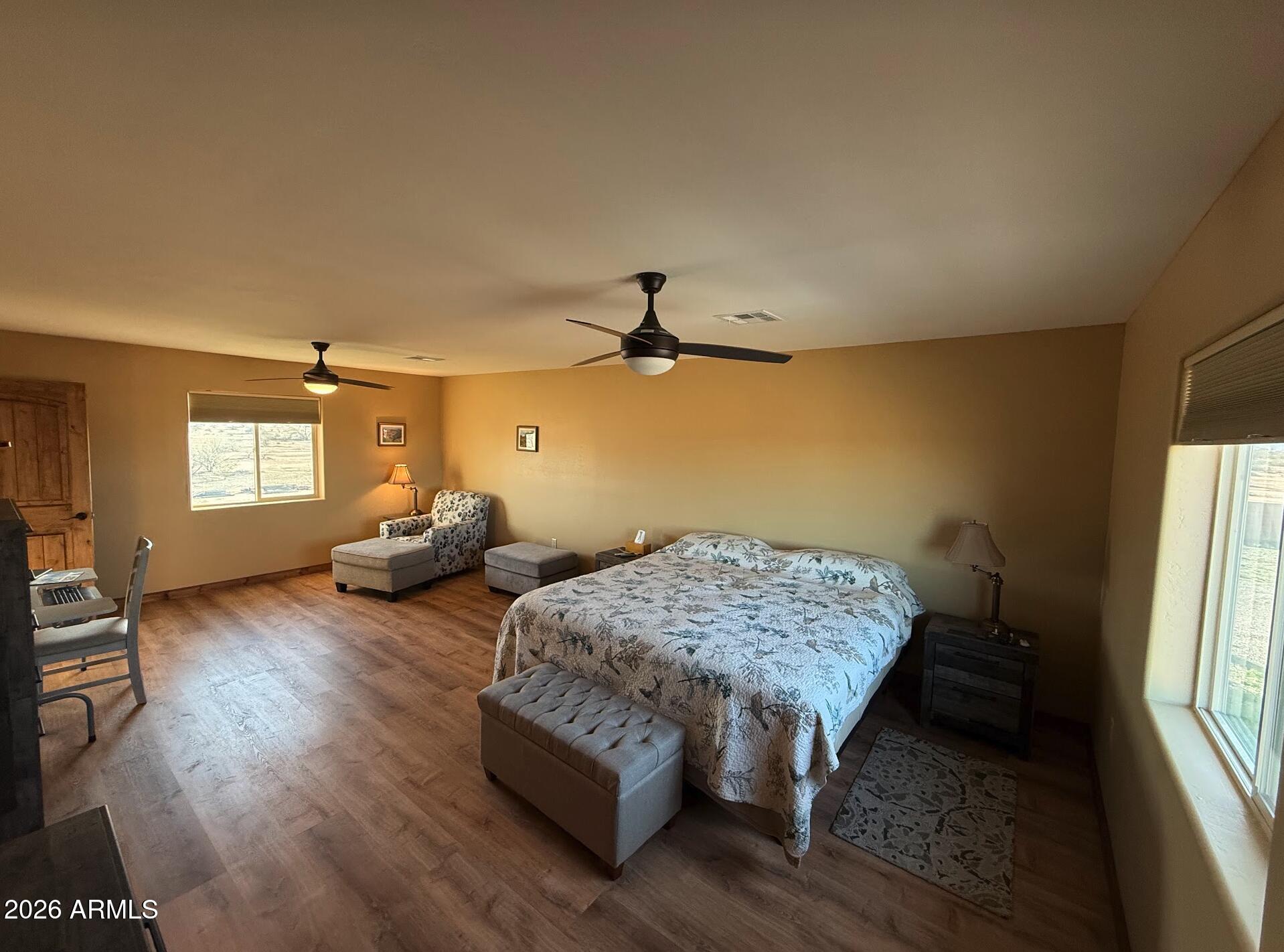 35723 South Amalia Road Eloy, AZ 85131 - Photo 17 of 34 a bedroom with bed couch and window
