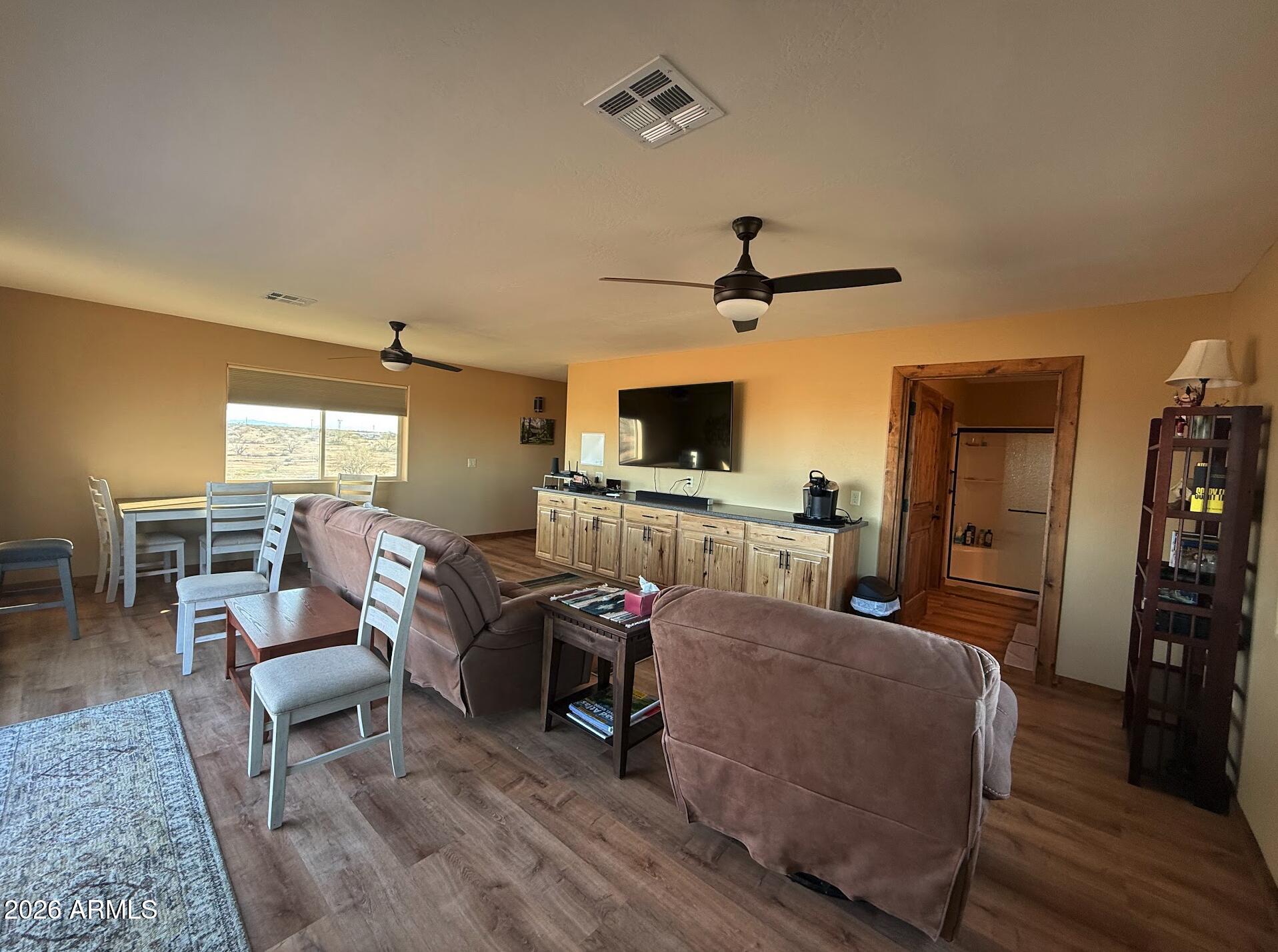 35723 South Amalia Road Eloy, AZ 85131 - Photo 25 of 34 a living room with furniture and a flat screen tv