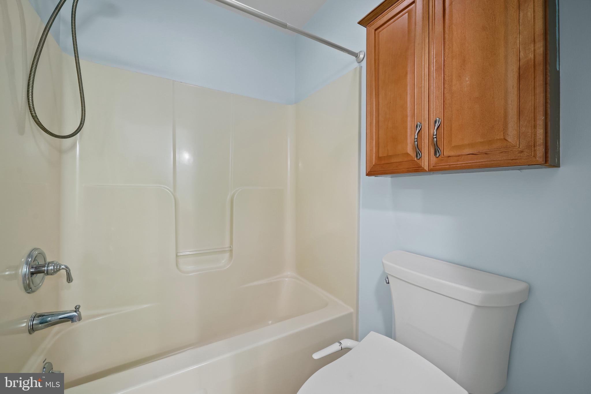 12221 Jerusalem Road Kingsville, MD 21087 - Photo 36 of 66 a bathroom with a toilet and a shower