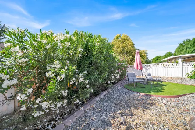a backyard of a house with lots of green space