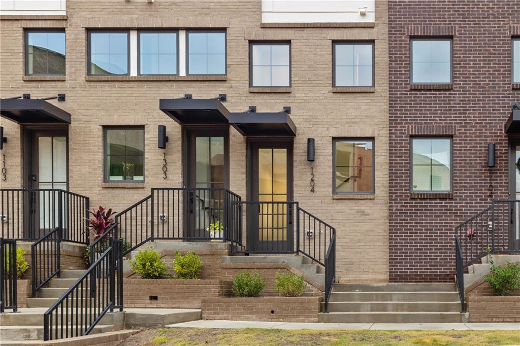 201 New Street, Unit 1204 Decatur, GA 30030 - Photo 2 of 26 a house view with a outdoor space