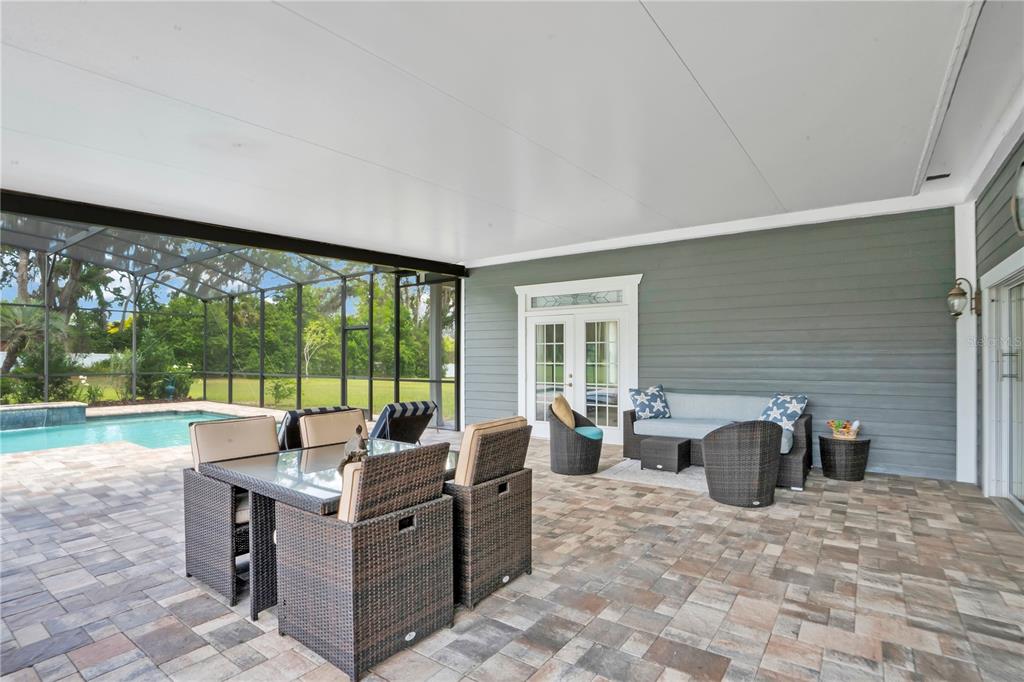 5785 Gilliam Road Orlando, FL 32818 - Photo 50 of 100 a living room with furniture and large windows