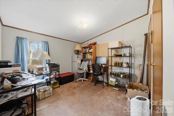 a room with furniture and a window