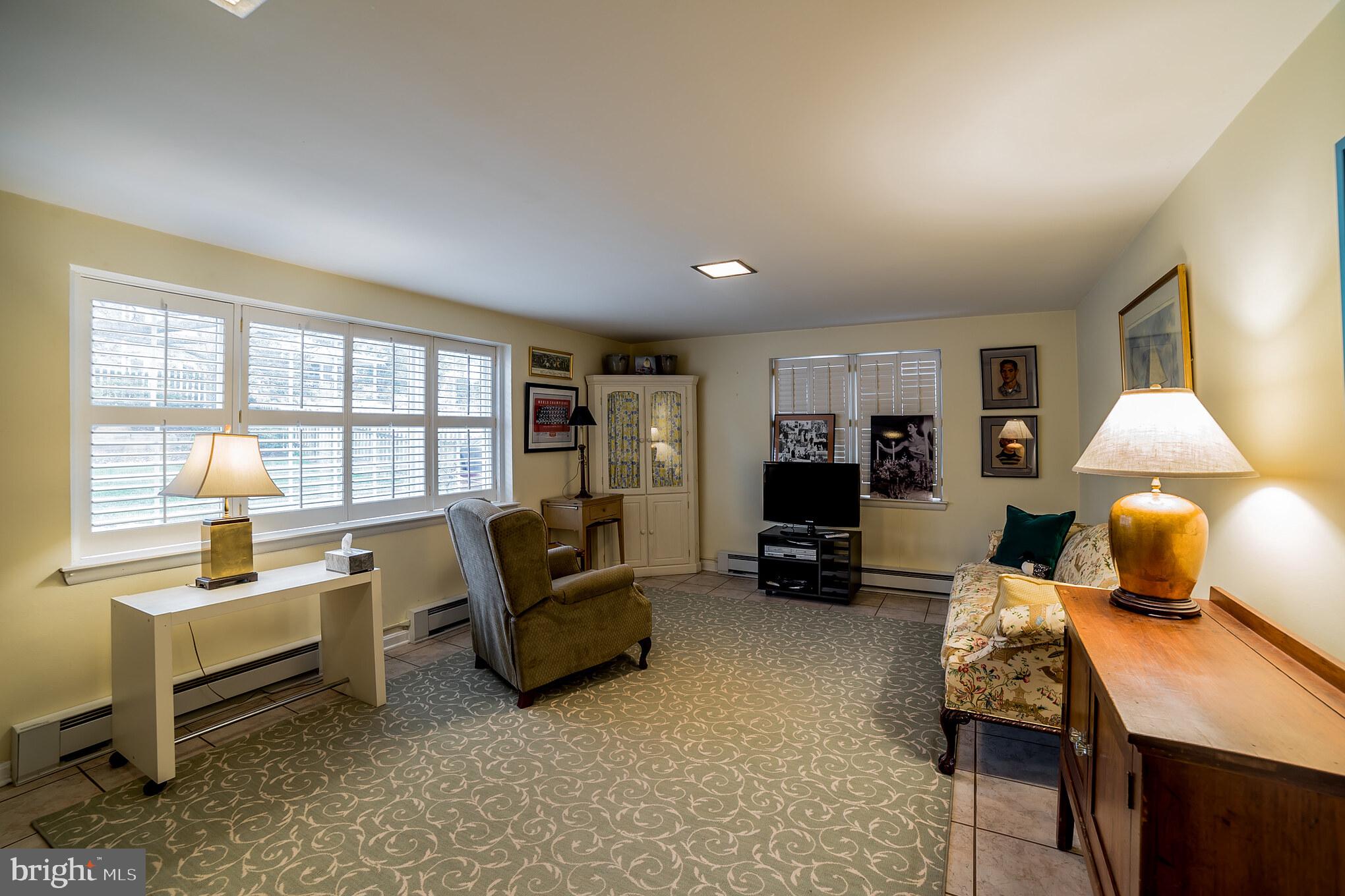 6123 Haddon Hall Road Baltimore, MD 21212 - Photo 21 of 27 family room with walk-out to rear patio