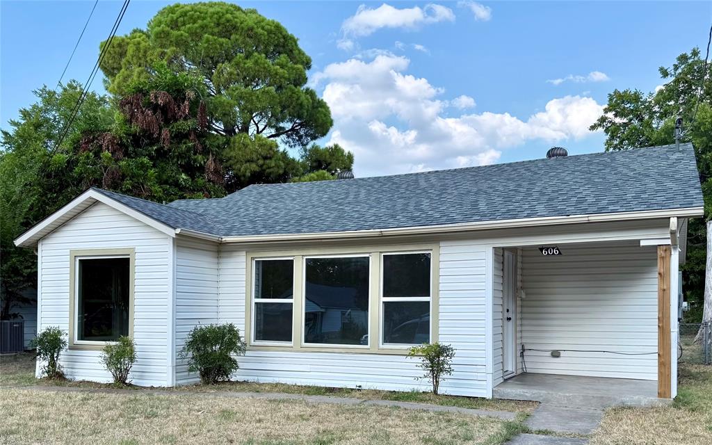 606 Worthview Drive River Oaks, TX 76114 - Photo 1 of 1 a front view of a house with garden