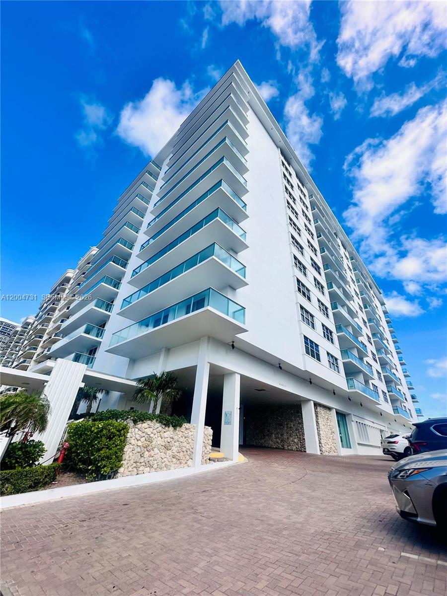 9511 Collins Avenue, Unit 1001 Surfside, FL 33154 - Photo 3 of 34 a view of a large building