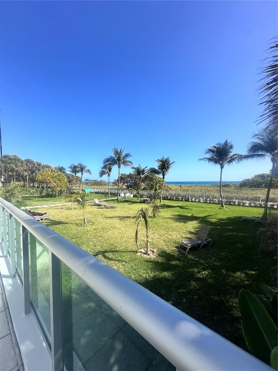 9511 Collins Avenue, Unit 1001 Surfside, FL 33154 - Photo 33 of 34 a view of a lake with a big yard