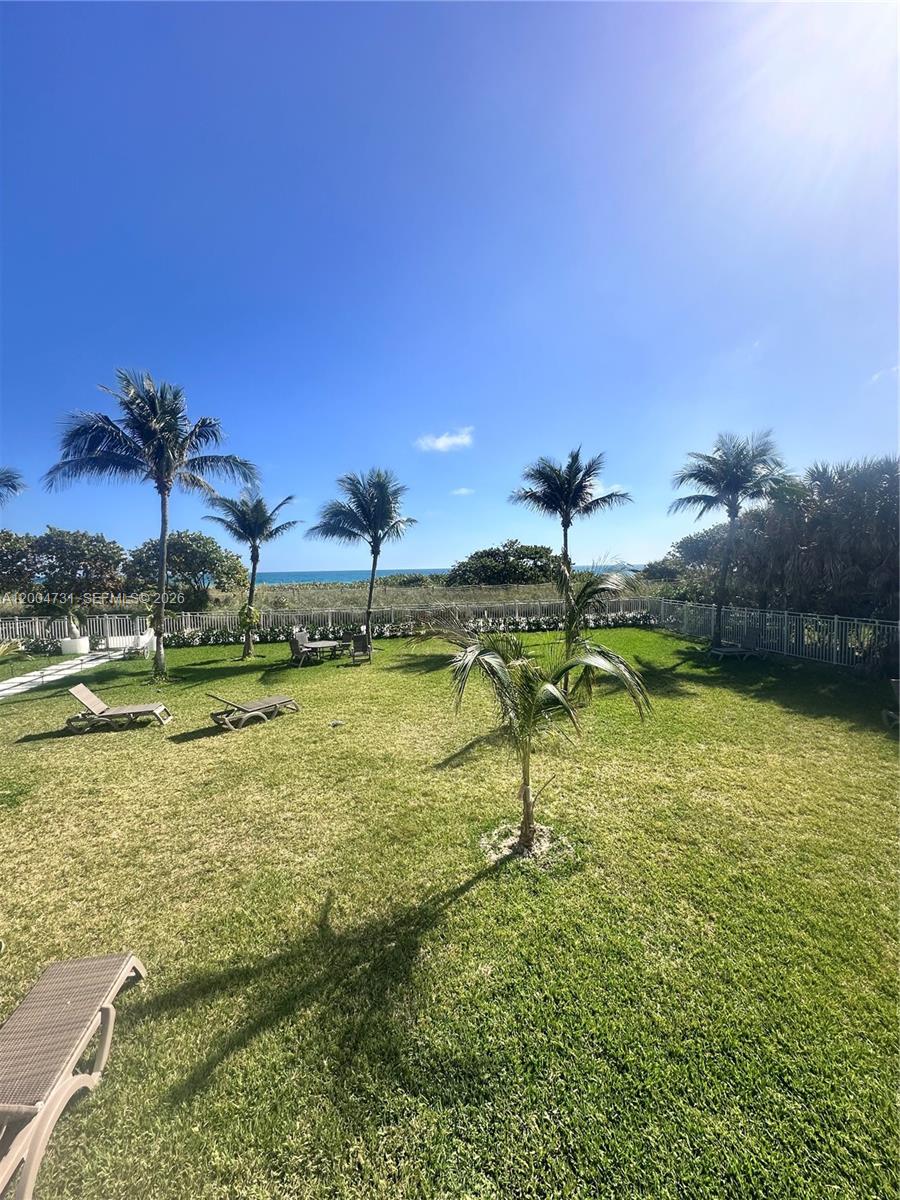 9511 Collins Avenue, Unit 1001 Surfside, FL 33154 - Photo 34 of 34 a view of a swimming pool with a yard