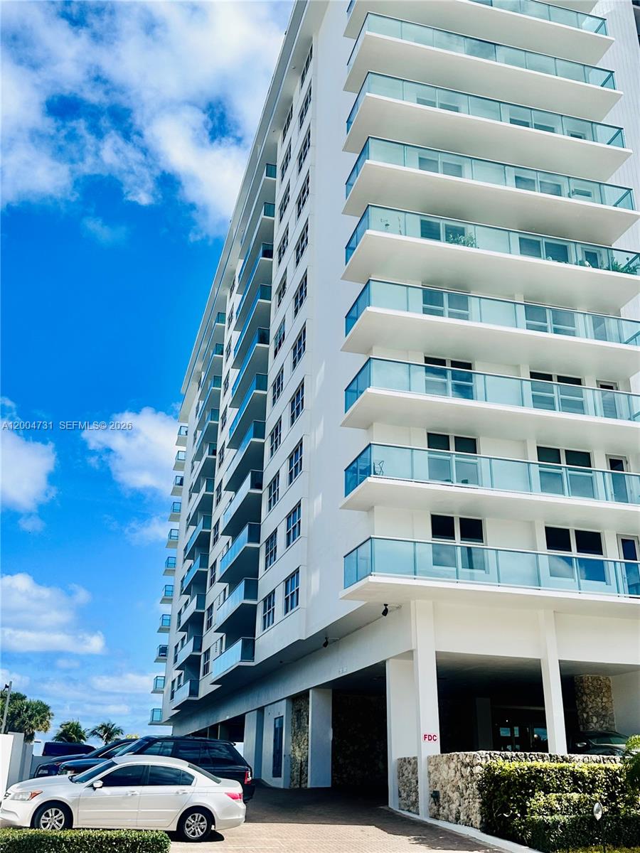9511 Collins Avenue, Unit 1001 Surfside, FL 33154 - Photo 4 of 34 a front view of a building