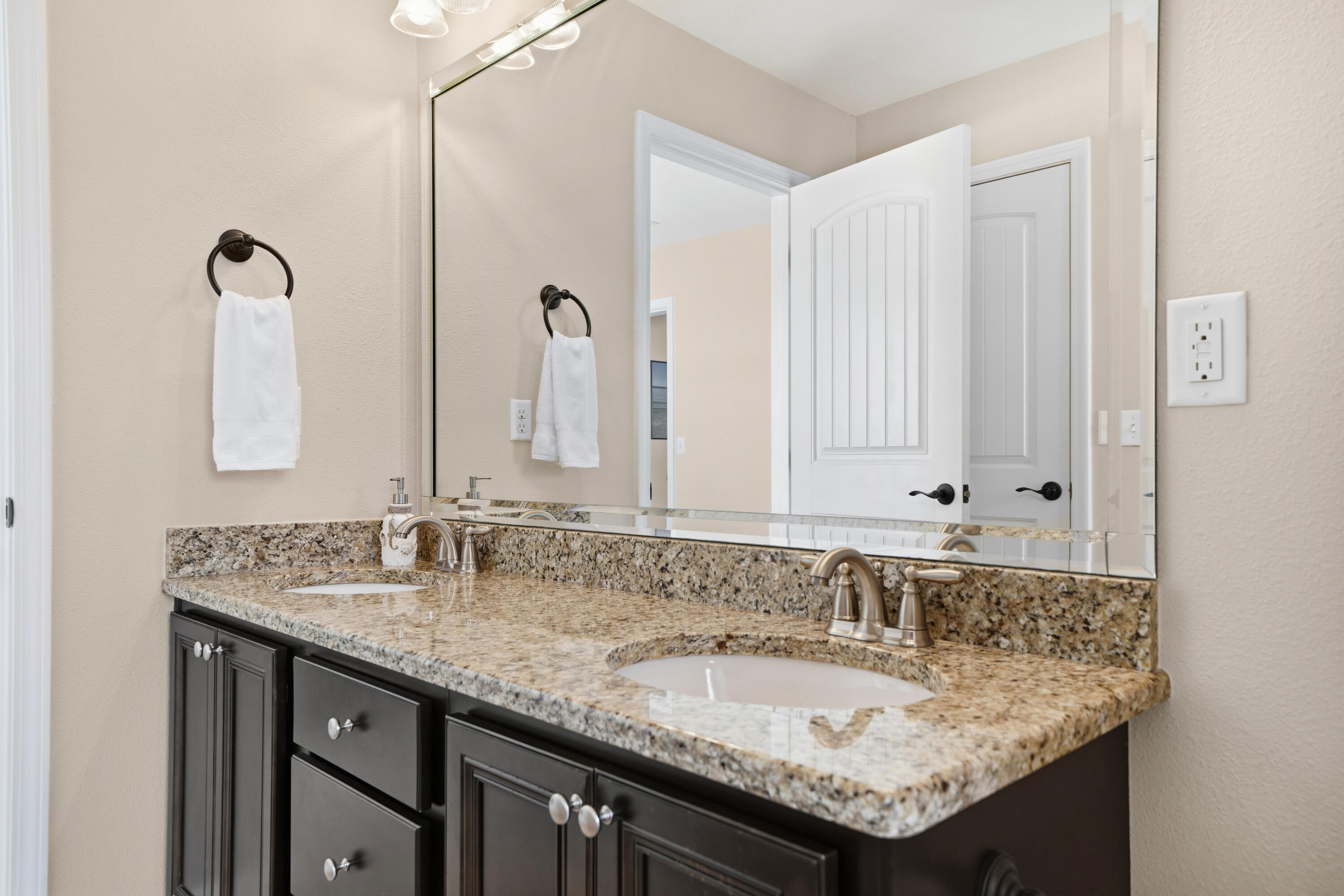 135 Grayling Way Inlet Beach, FL 32461 - Photo 18 of 61 a bathroom with a granite countertop sink and a mirror