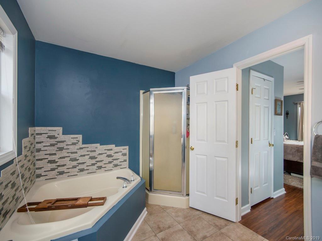 30 North Ridge Point, Unit T3 Sylva, NC 28779 - Photo 13 of 18 a bathroom with a tub and shower