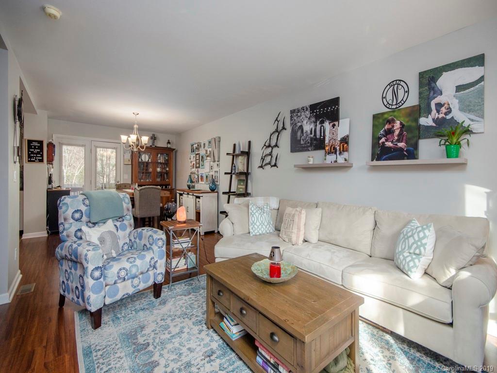 30 North Ridge Point, Unit T3 Sylva, NC 28779 - Photo 5 of 18 a living room with furniture and wooden floor