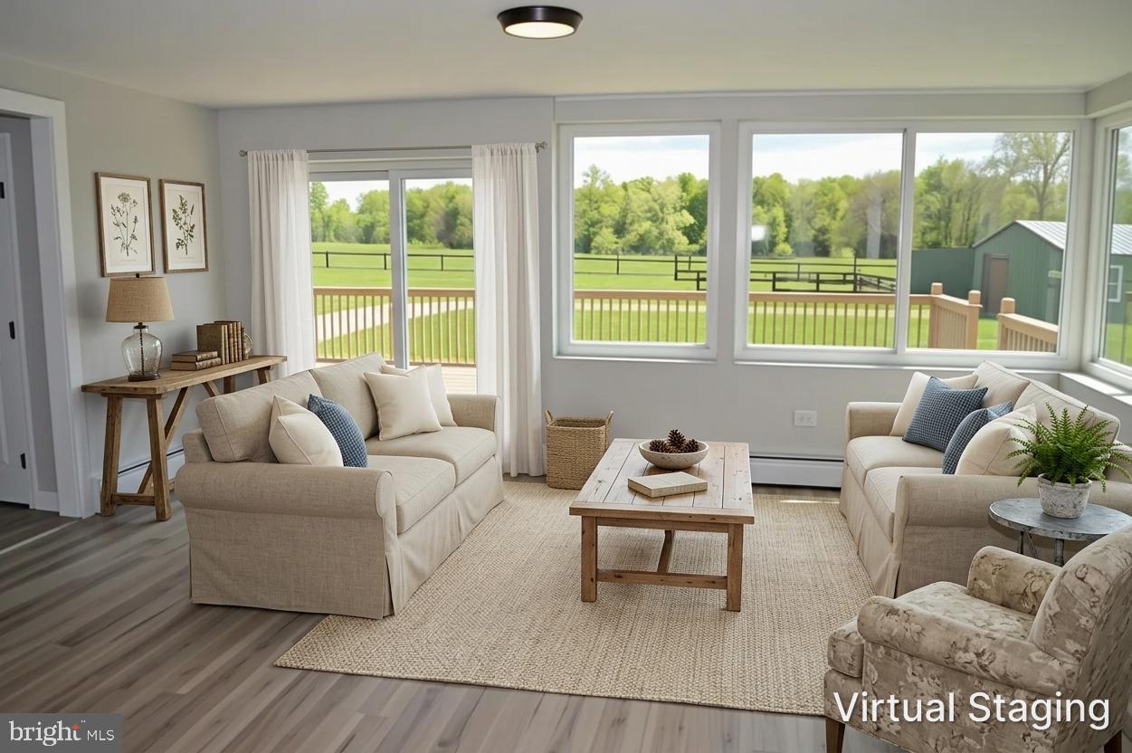 2051 Stover Road Taneytown, MD 21787 - Photo 16 of 44 a living room with furniture and a large window