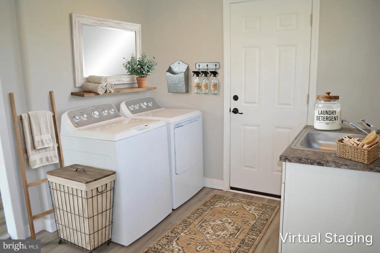 2051 Stover Road Taneytown, MD 21787 - Photo 18 of 44 a room with a washing machine