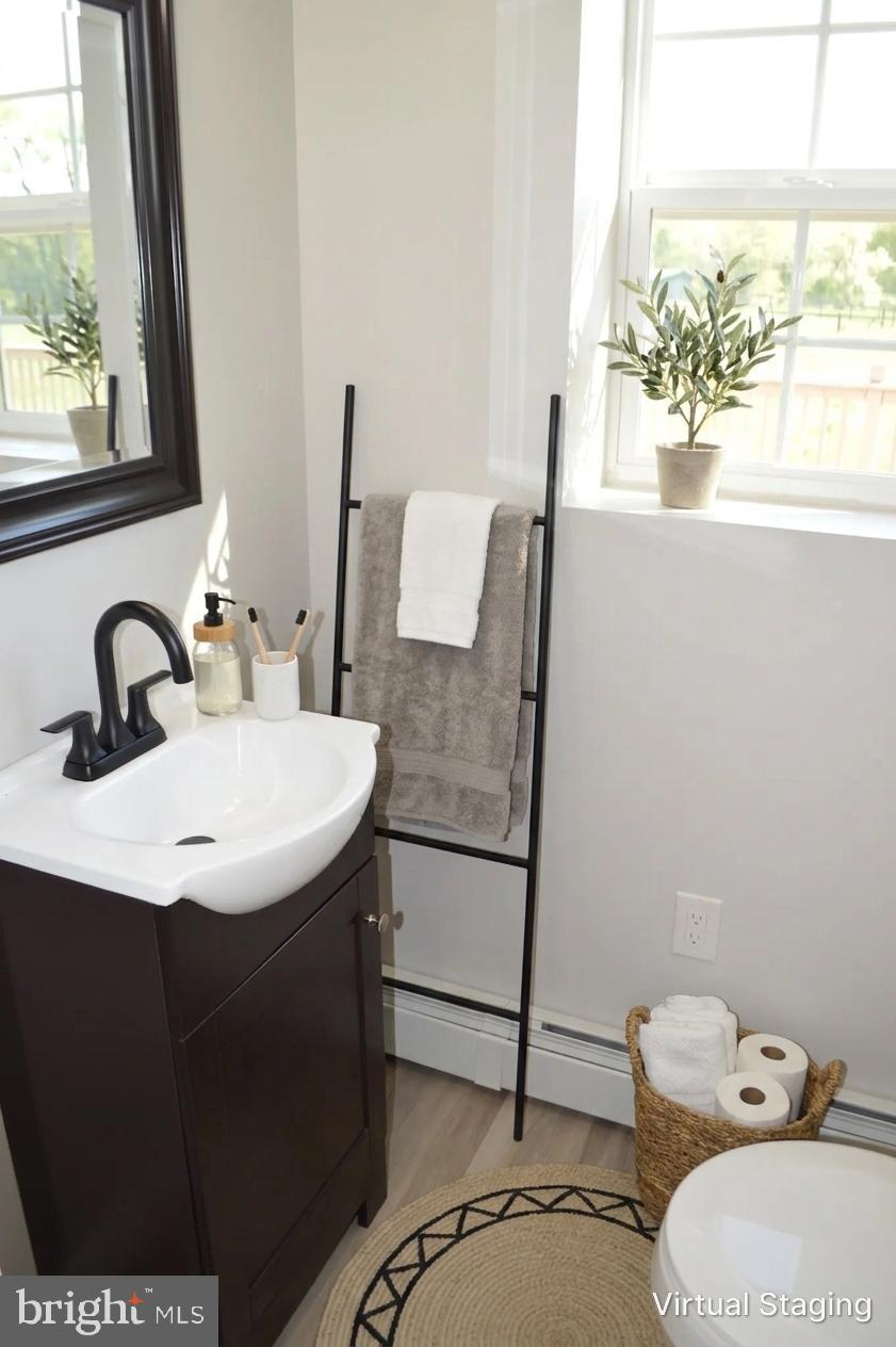 2051 Stover Road Taneytown, MD 21787 - Photo 20 of 44 a bathroom with a sink and a mirror