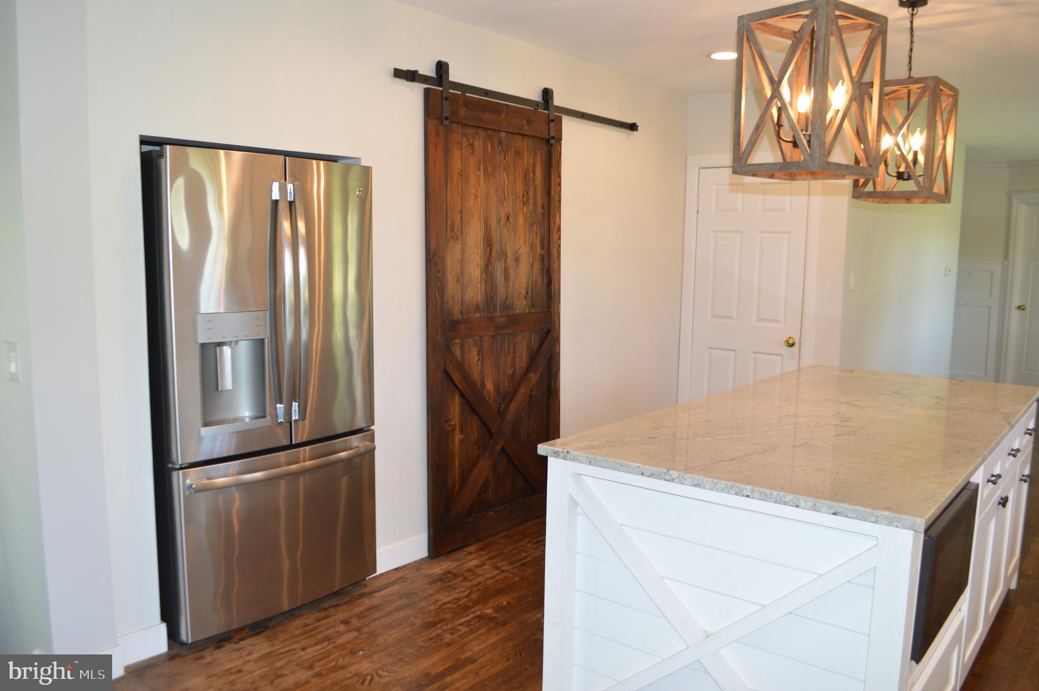 2051 Stover Road Taneytown, MD 21787 - Photo 28 of 44 a room with storage and utility