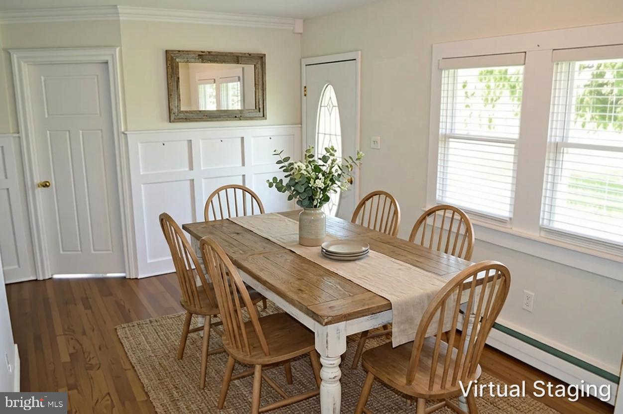 2051 Stover Road Taneytown, MD 21787 - Photo 29 of 44 a view of a a dining room with furniture window and wooden floor