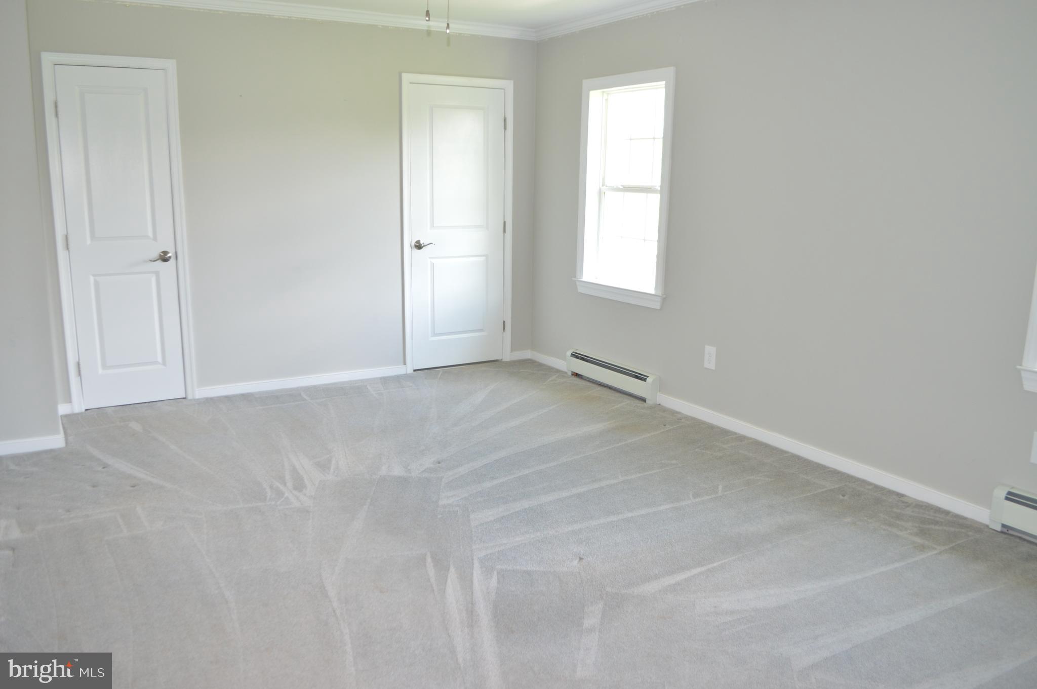 2051 Stover Road Taneytown, MD 21787 - Photo 32 of 44 an empty room with windows