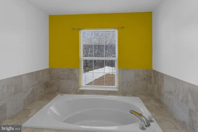a bathroom with a bathtub