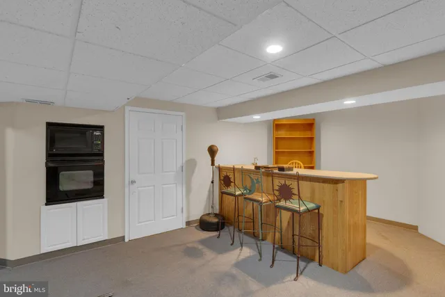 a view of a livingroom with furniture