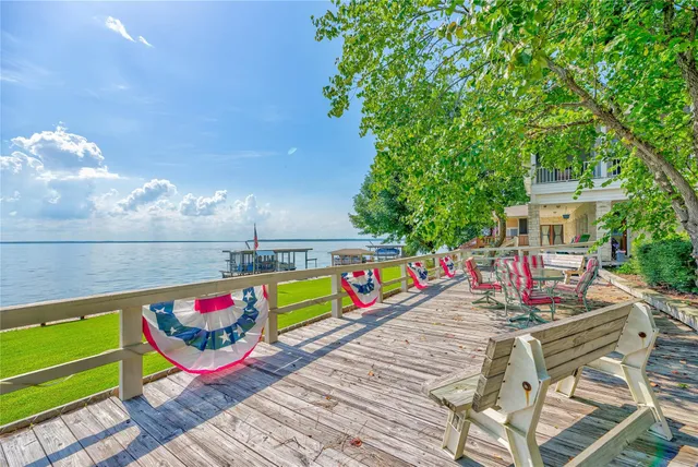 a view of a chairs and table on the wooden floor