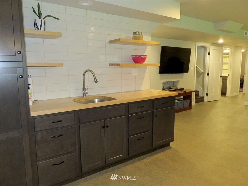 2664 Brown Road Ferndale, WA 98248 - Photo 11 of 16 a spacious bathroom with a double vanity sink and mirror