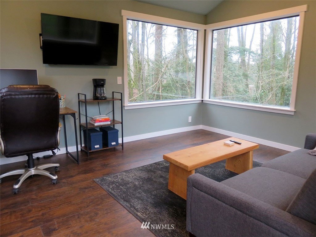 2664 Brown Road Ferndale, WA 98248 - Photo 14 of 16 a living room with furniture and a flat screen tv