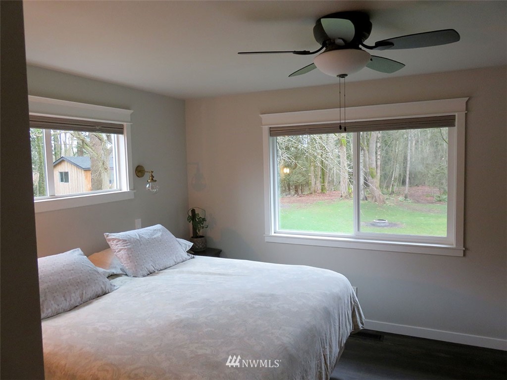 2664 Brown Road Ferndale, WA 98248 - Photo 10 of 16 a bedroom with a large bed and a window