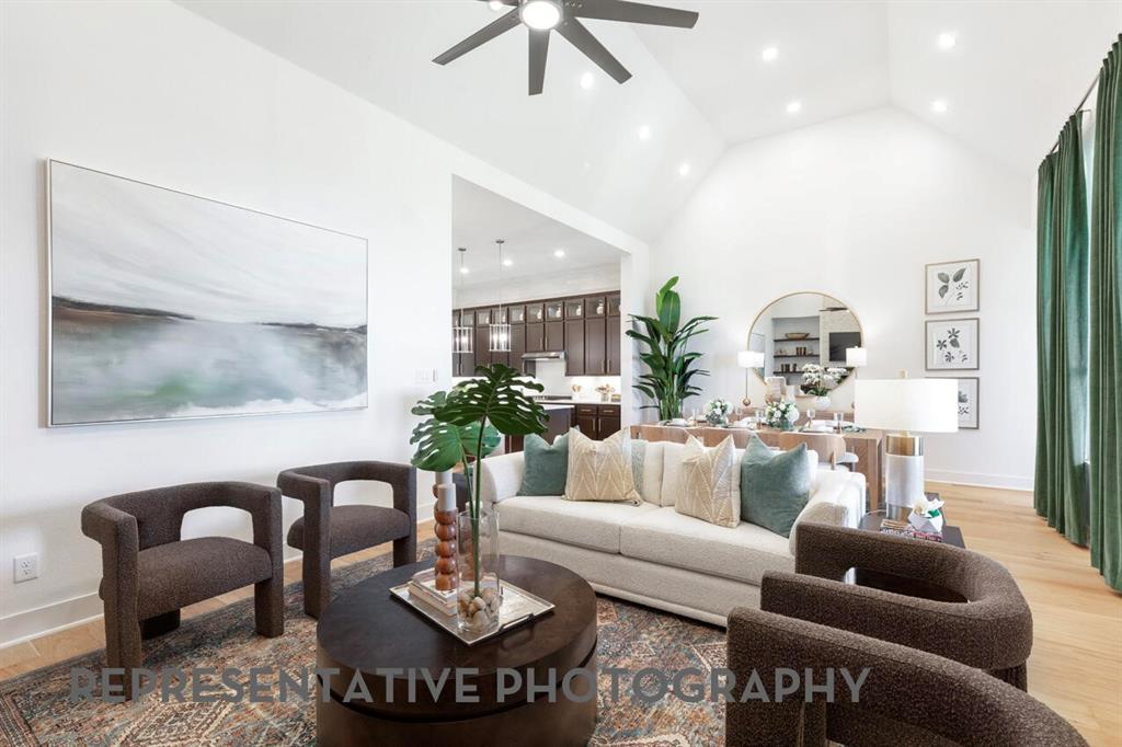 2907 Messenger Street Forney, TX 75126 - Photo 12 of 40 a living room with furniture and a painting