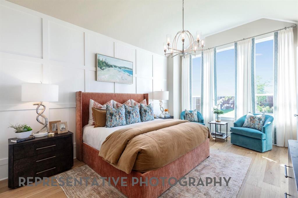 2907 Messenger Street Forney, TX 75126 - Photo 15 of 40 a bedroom with a bed and a couch