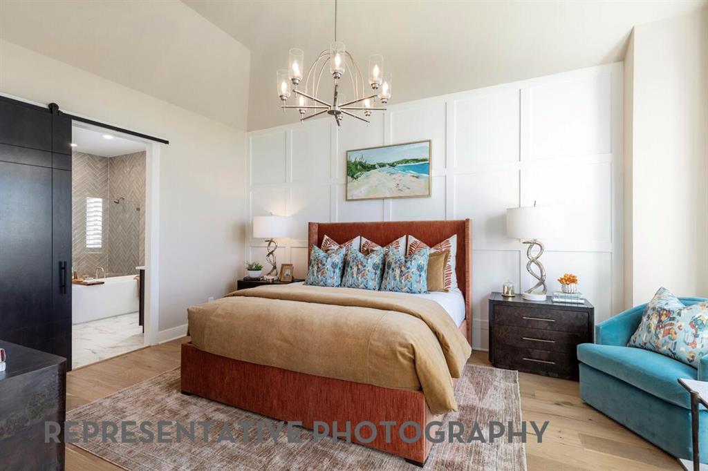 2907 Messenger Street Forney, TX 75126 - Photo 16 of 40 a bedroom with a bed and a couch