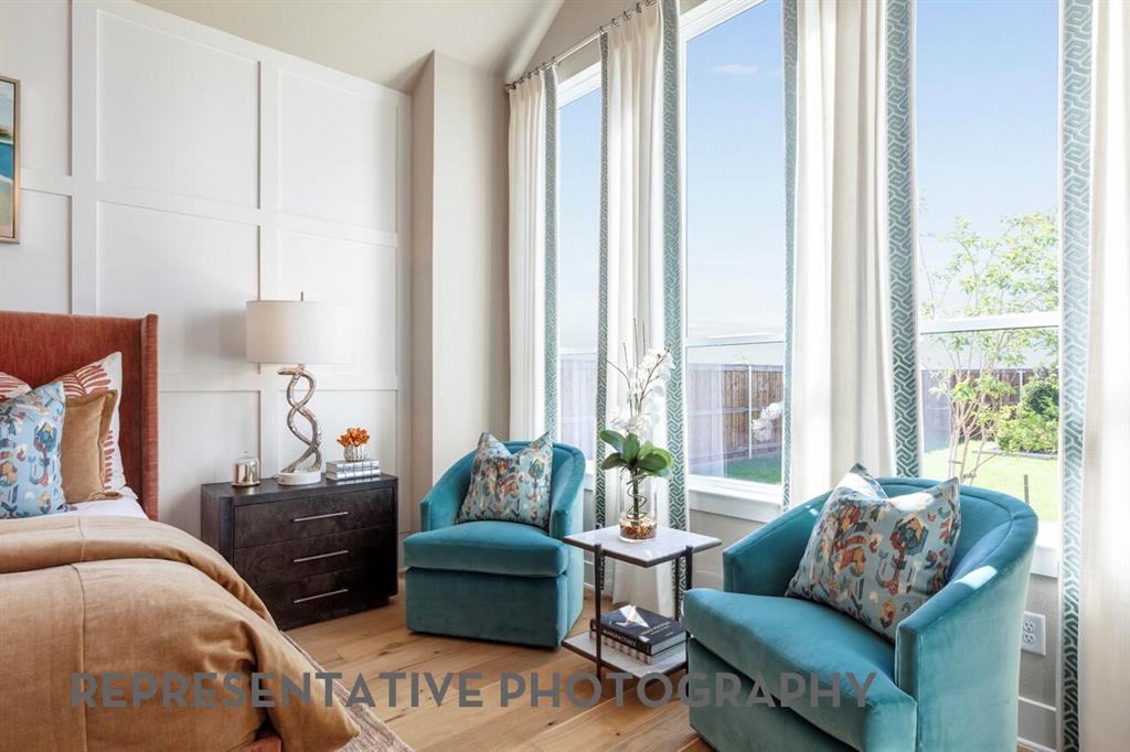 2907 Messenger Street Forney, TX 75126 - Photo 17 of 40 a bedroom with furniture and a large window