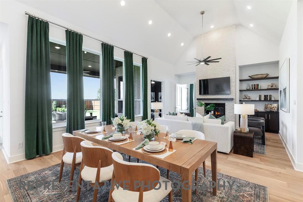 2907 Messenger Street Forney, TX 75126 - Photo 25 of 40 a view of a dining room with furniture window and wooden floor