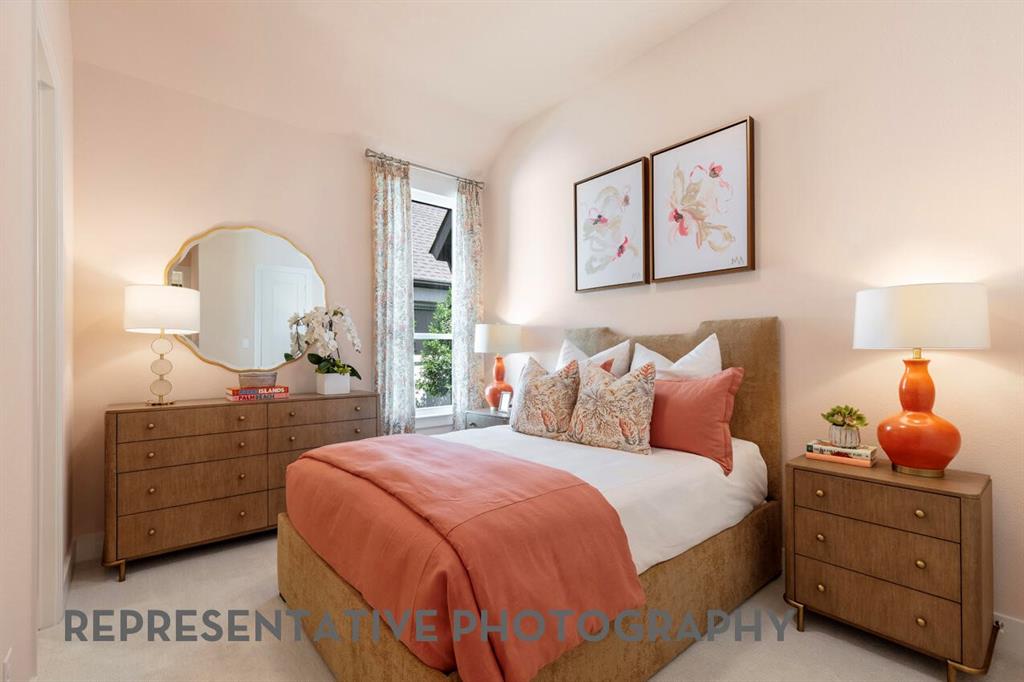 2907 Messenger Street Forney, TX 75126 - Photo 30 of 40 a bedroom with a bed and a lamp on dresser