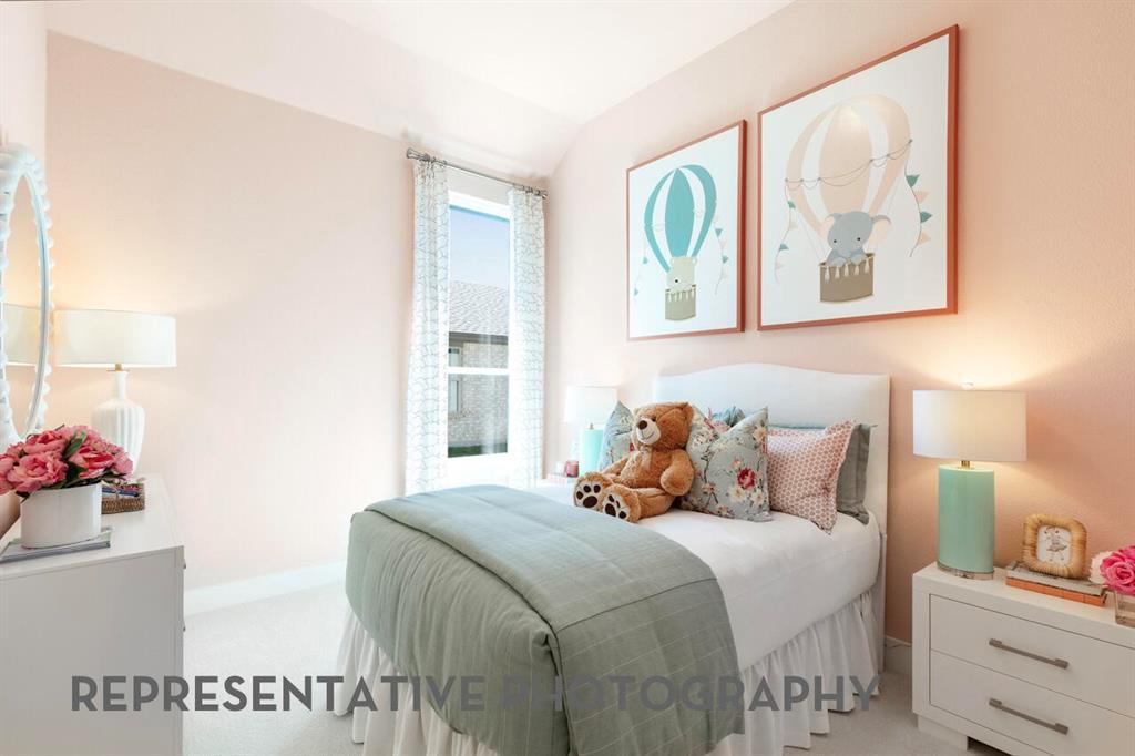 2907 Messenger Street Forney, TX 75126 - Photo 32 of 40 a bedroom with a bed and a painting on the wall