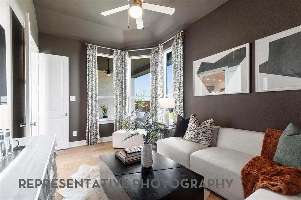 2907 Messenger Street Forney, TX 75126 - Photo 36 of 40 a living room with furniture and a large window