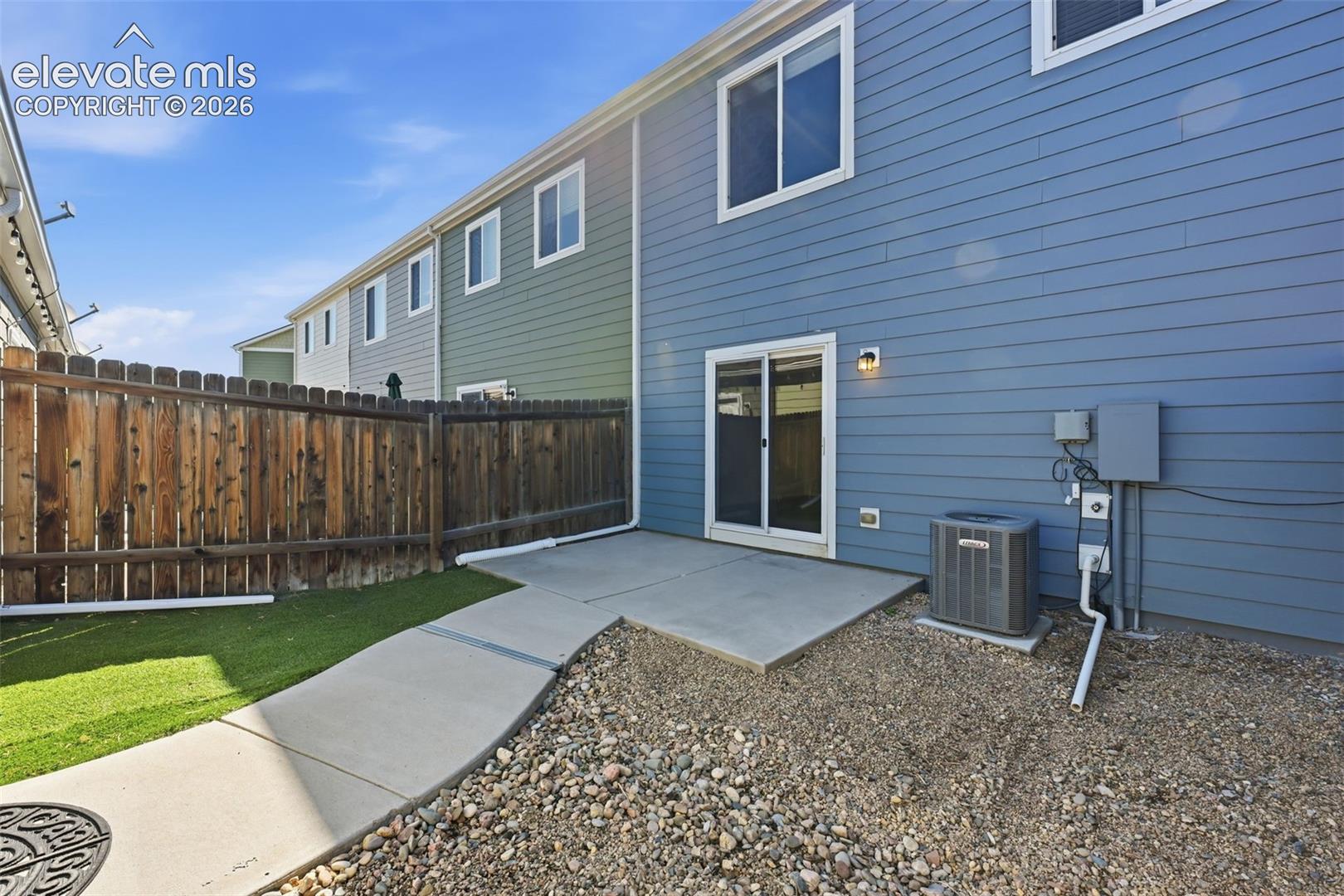 6306 Pilgrimage Road Colorado Springs, CO 80925 - Photo 30 of 37 private yard with turf and gravel
