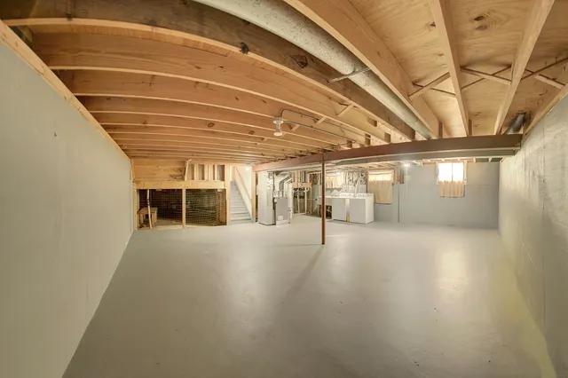 a view of a livingroom with wooden floor