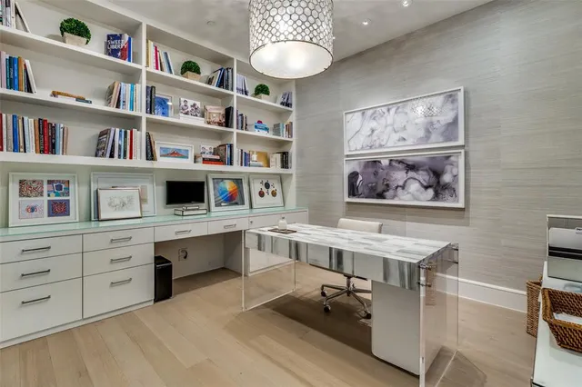 a view of a workspace with furniture