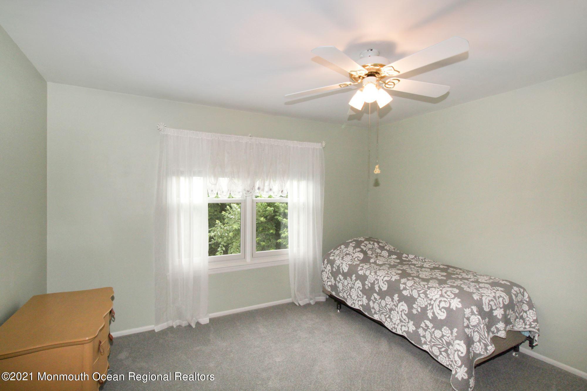 8 Derringer Drive Howell, NJ 07731 - Photo 20 of 33 a bedroom with a bed and a window
