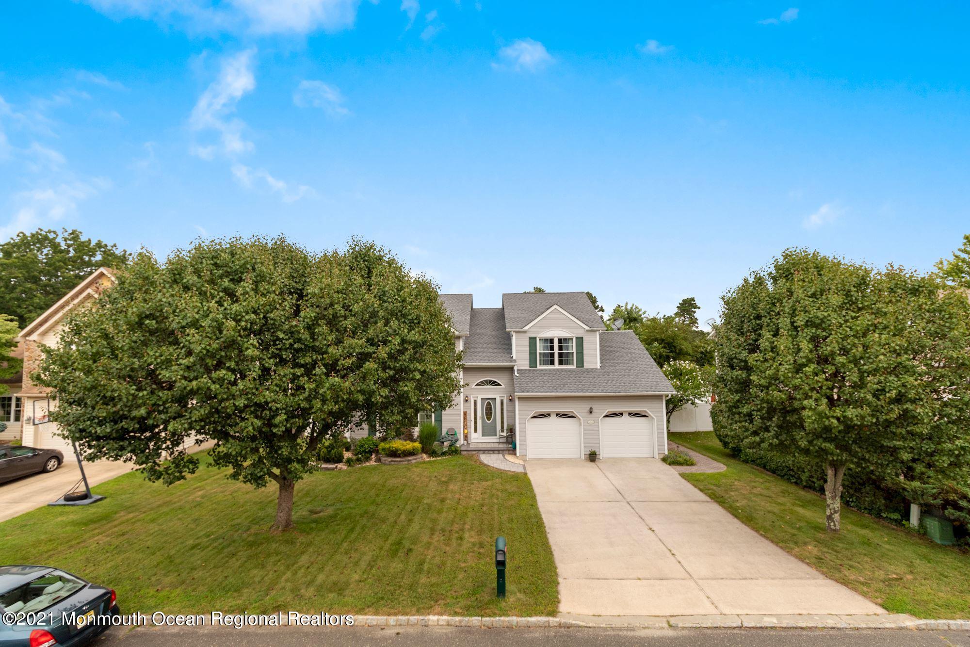 8 Derringer Drive Howell, NJ 07731 - Photo 4 of 33 a view of a house with a yard