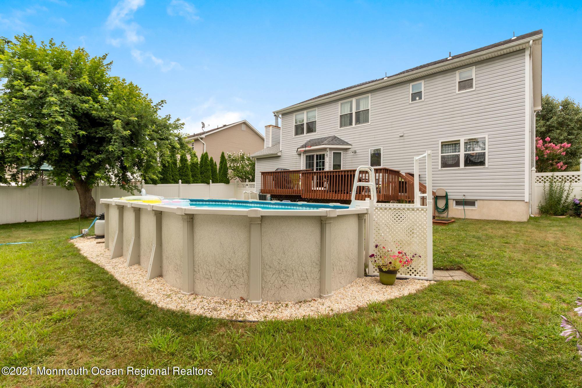 8 Derringer Drive Howell, NJ 07731 - Photo 31 of 33 a view of a house with a yard