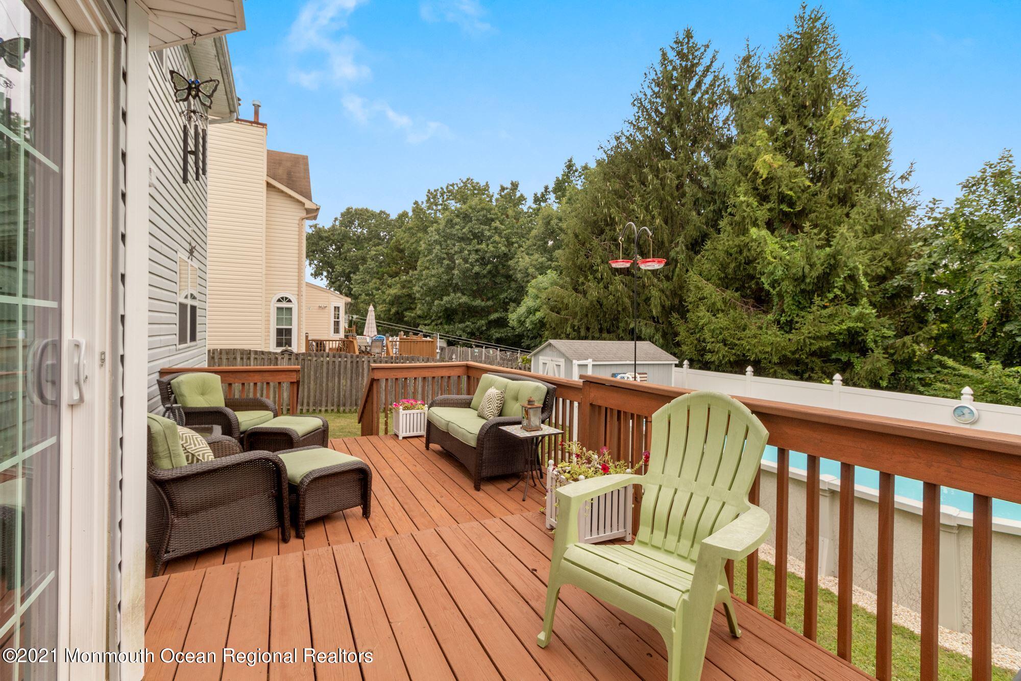 8 Derringer Drive Howell, NJ 07731 - Photo 32 of 33 a view of roof deck with patio
