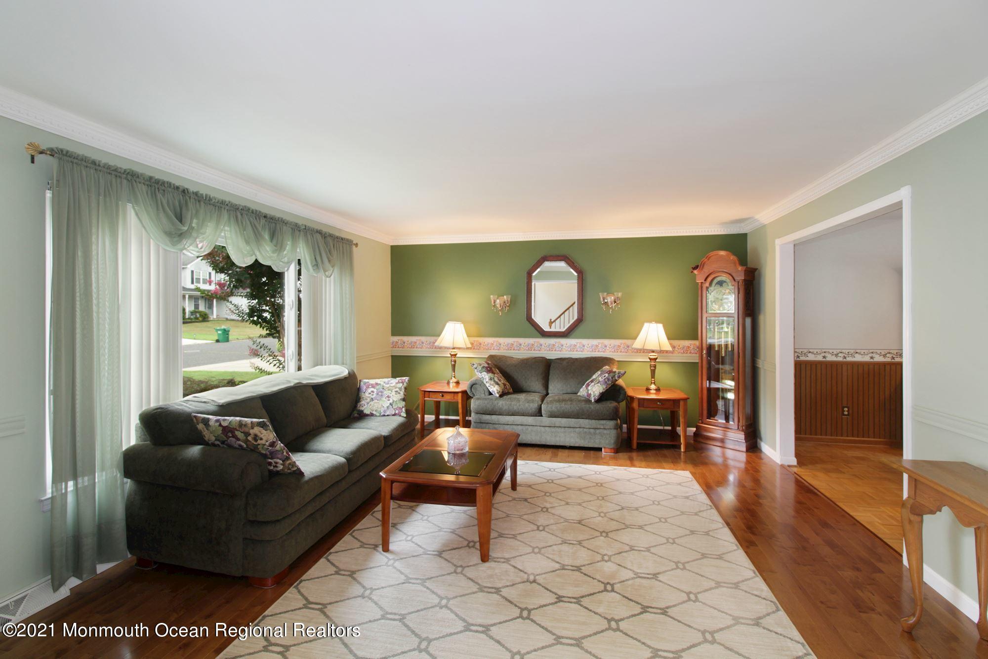 8 Derringer Drive Howell, NJ 07731 - Photo 5 of 33 a living room with furniture and a window