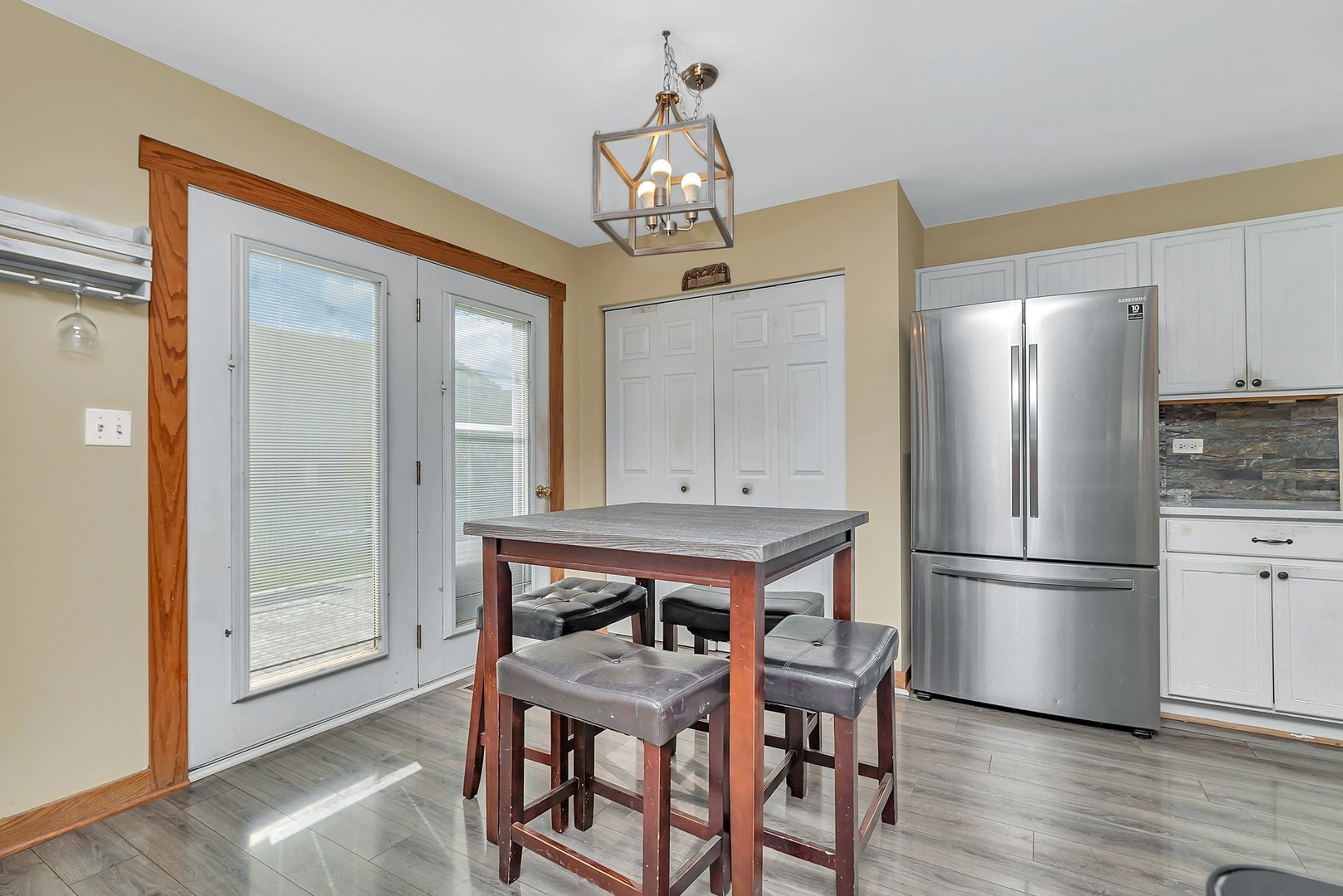 27039 West Hemlock Road Channahon, IL 60410 - Photo 11 of 41 a kitchen with stainless steel appliances granite countertop a refrigerator and a stove top oven