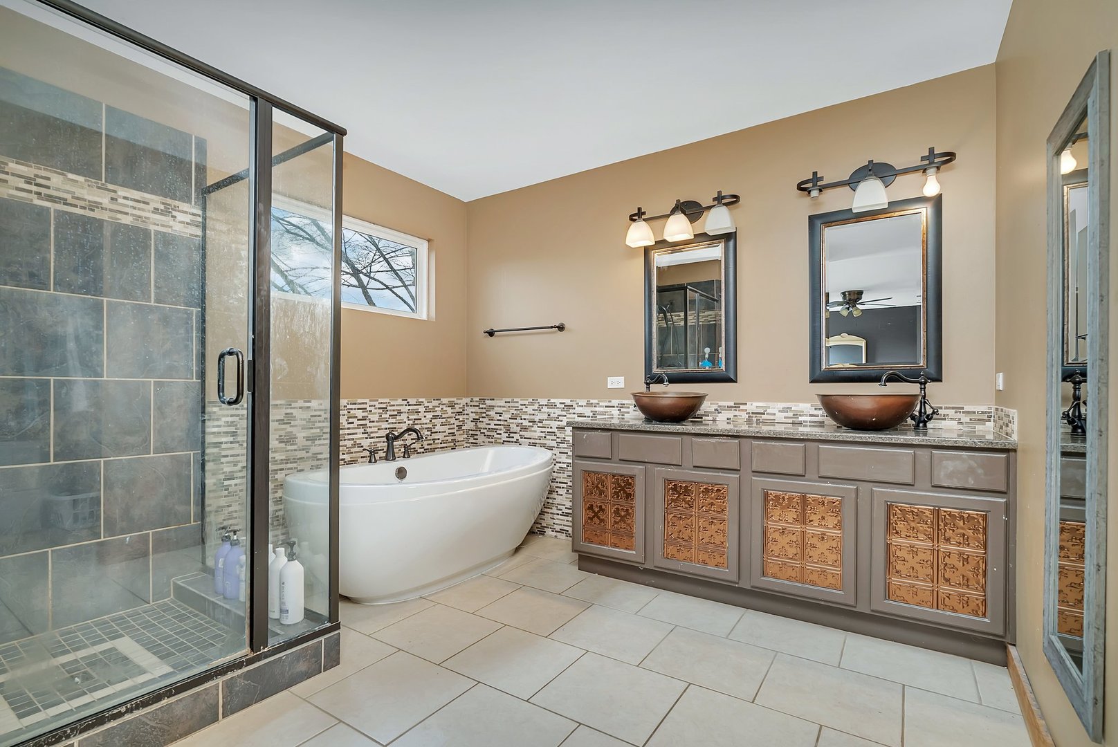 27039 West Hemlock Road Channahon, IL 60410 - Photo 25 of 41 a spacious bathroom with a granite countertop sink and a mirror