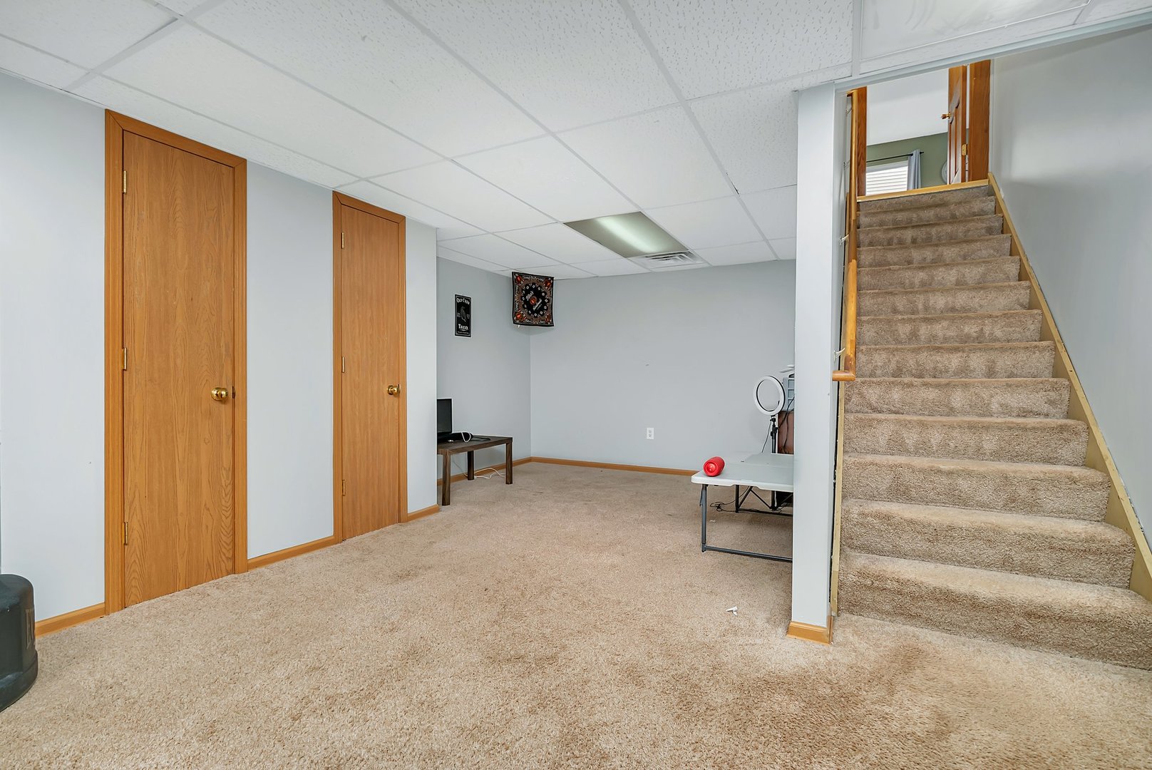 27039 West Hemlock Road Channahon, IL 60410 - Photo 31 of 41 a view of an empty room with stairs and furniture